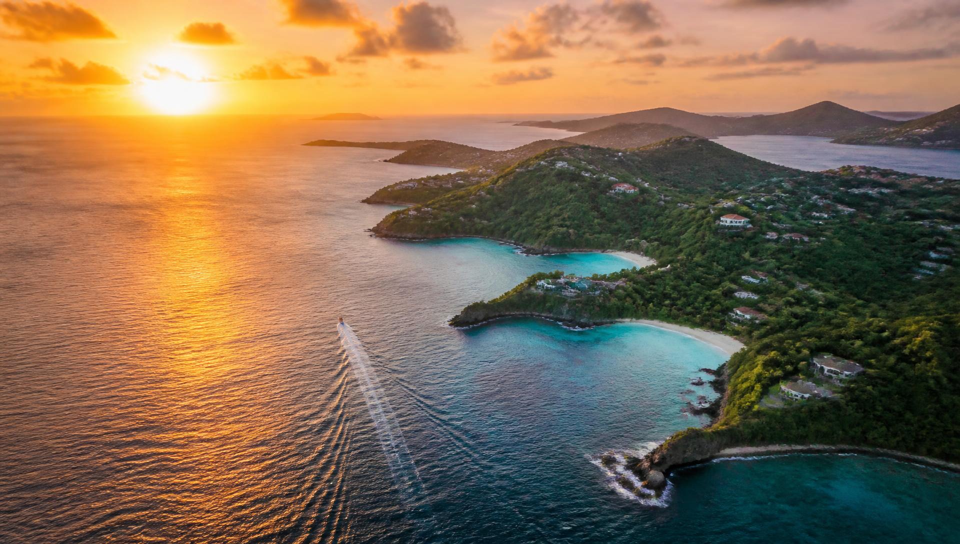 Aerial view of Roatán's coastline at sunset
